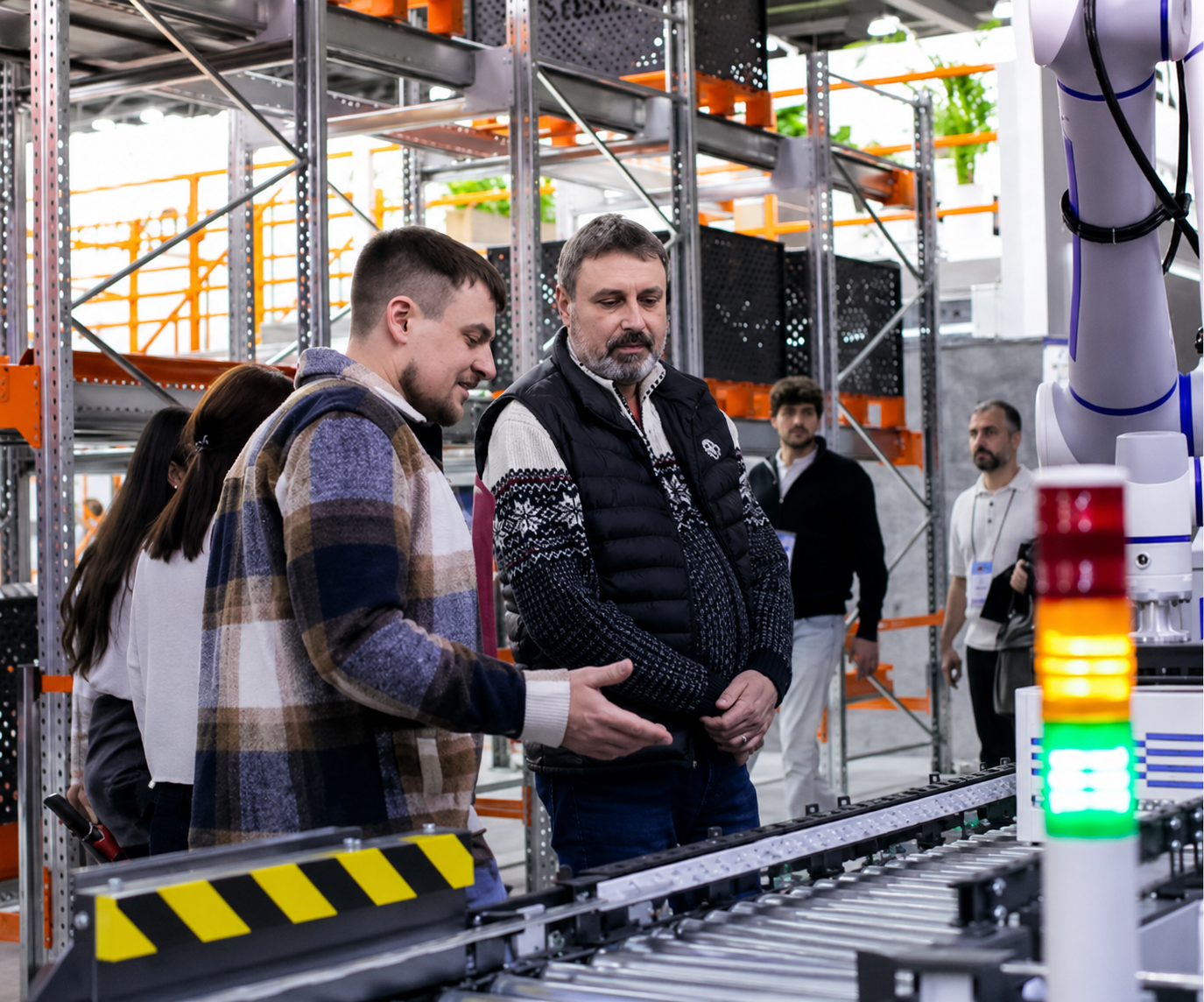 Warehouse robotic conveyor automation